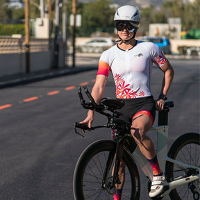women's triathlon suit with sleeves, color white with flowers  made in france kiwami swim bike run 